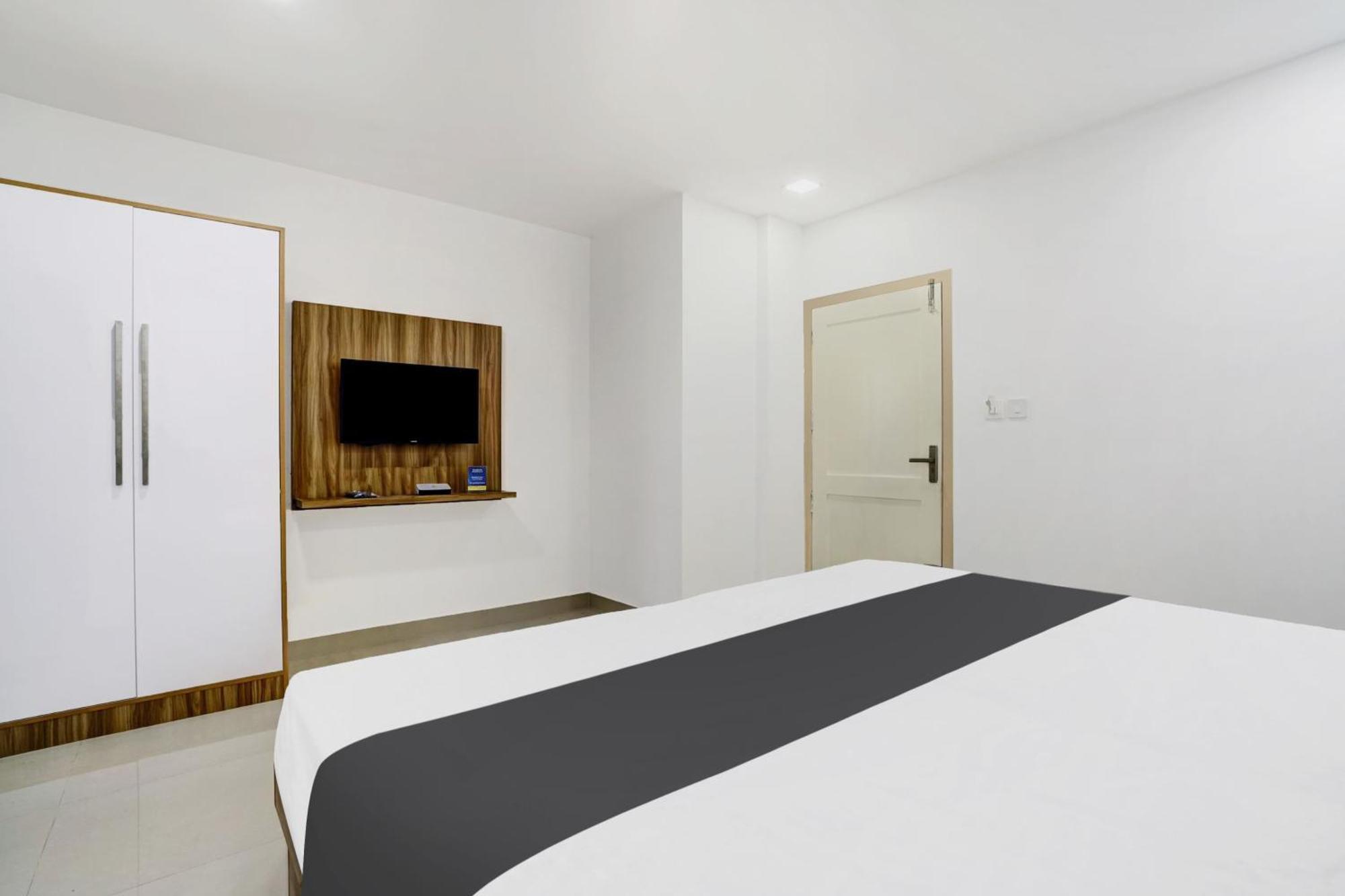 Hotel O Grand Parassini Pāppinisseri Esterno foto
